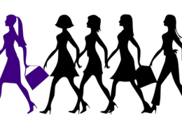 multiple black icons of women following a purple icon of a woman